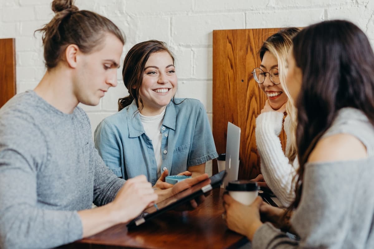 A diverse group of first-time buyers and aspiring investors learning together through LEG